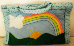 Wickeltasche mit Puppe aus Stoff