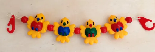 Kinderwagenkette mit 4 Rasselvögeln