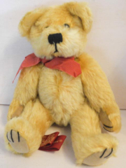 Teddybär hellbraun mit roter Masche