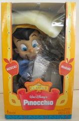 Marionette Pinocchio singt Weihnachtslieder