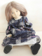 Puppe aus Stoff mit blauem Kleid