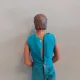 Ken Puppe mit türkisfarbenem Fitness-Anzug