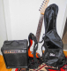 E-Gitarre mit Hülle und Verstärker