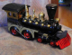 Holzlokomotive schwarz/gold